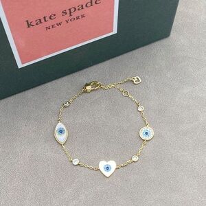 Kate Spade Gold Bracelet with Blue and White Accents